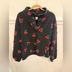 vestique Black Sherpa Pullover with Red Cherry Accents